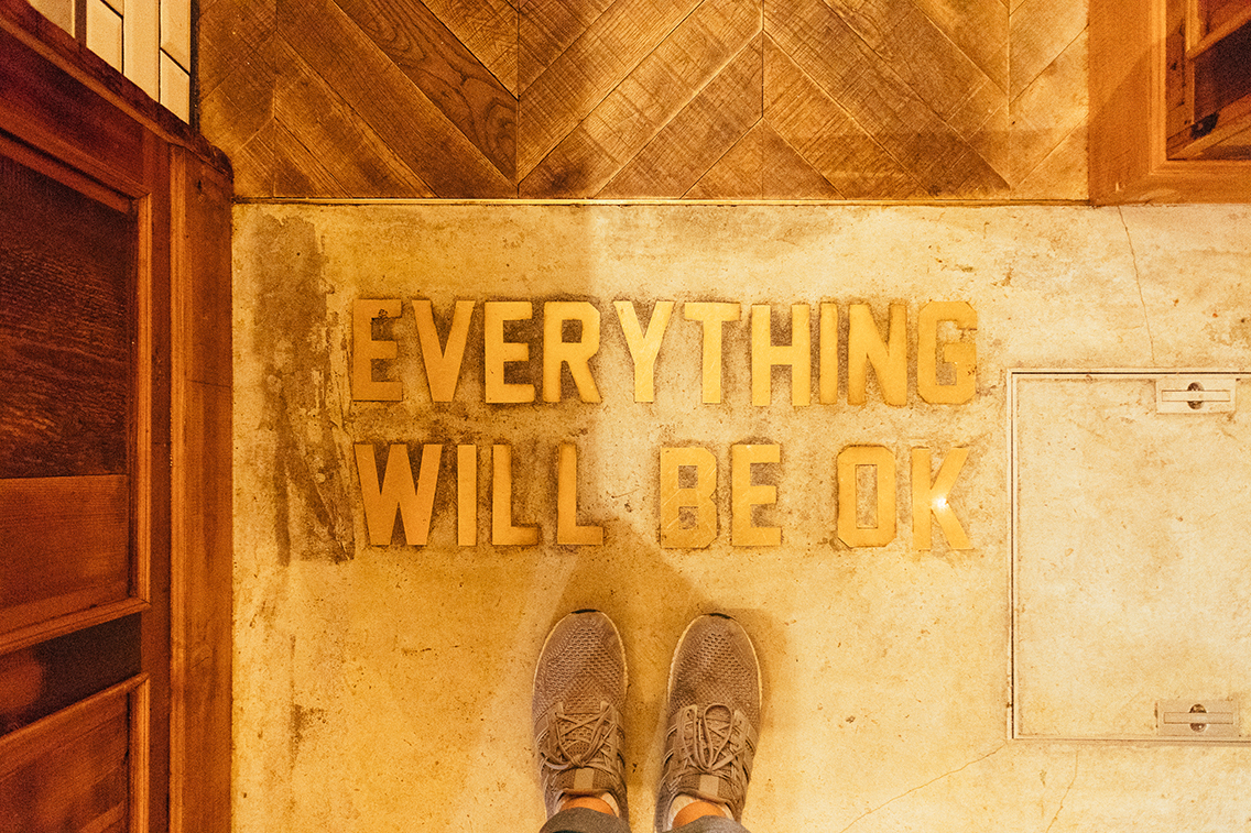 Everything Will Be Ok - reassurance found on the floor of a donut shop.